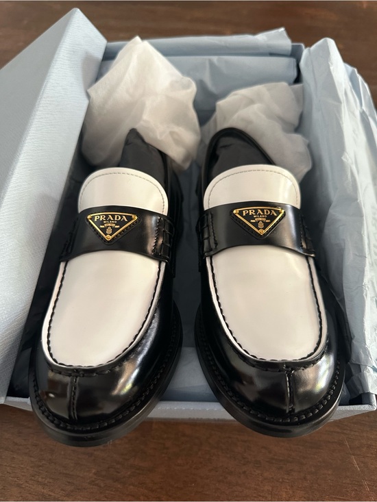 Prada Shoes - Prada Black and White Leather Penny Loafers with Gold Logo
